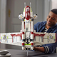 A man holds up Lego's new, and very large, Star Wars Ultimate Collector Series Republic Gunship.